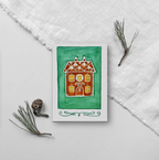 Weihnachtskarte mit Lebkuchenhaus